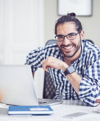 Young man is working at home